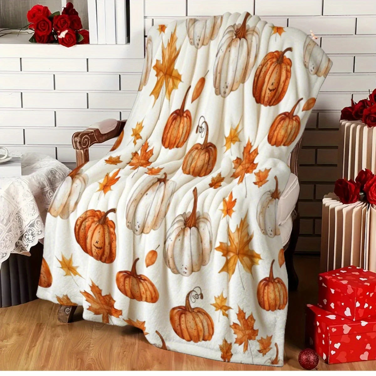 Herbstdecke mit Kürbis- und Blättermuster