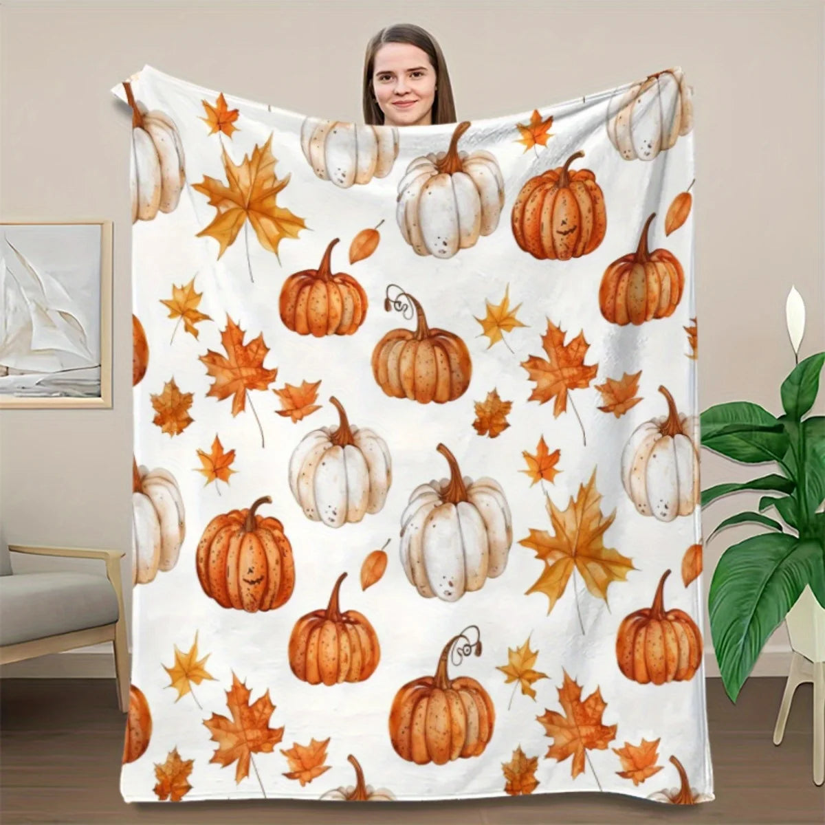 Herbstdecke mit Kürbis- und Blättermuster